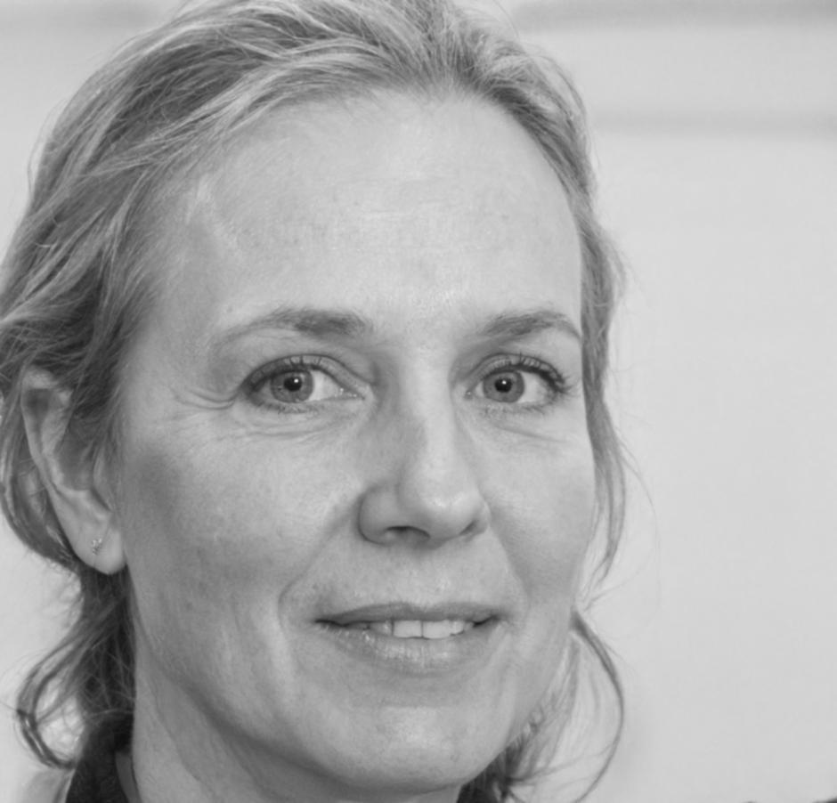 Professional headshot of senior financial strategist