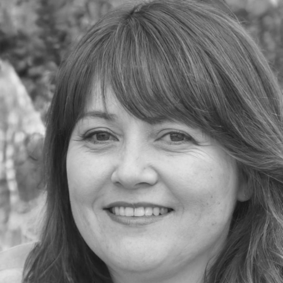 Professional headshot of implementation coordinator